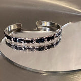 MODEFREAKのブラッククリスタルバングル mf1845の画像