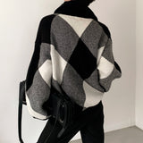 MODEFREAKのルーズチェックニットトップス mf2113の画像