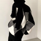 MODEFREAKのルーズチェックニットトップス mf2113の画像